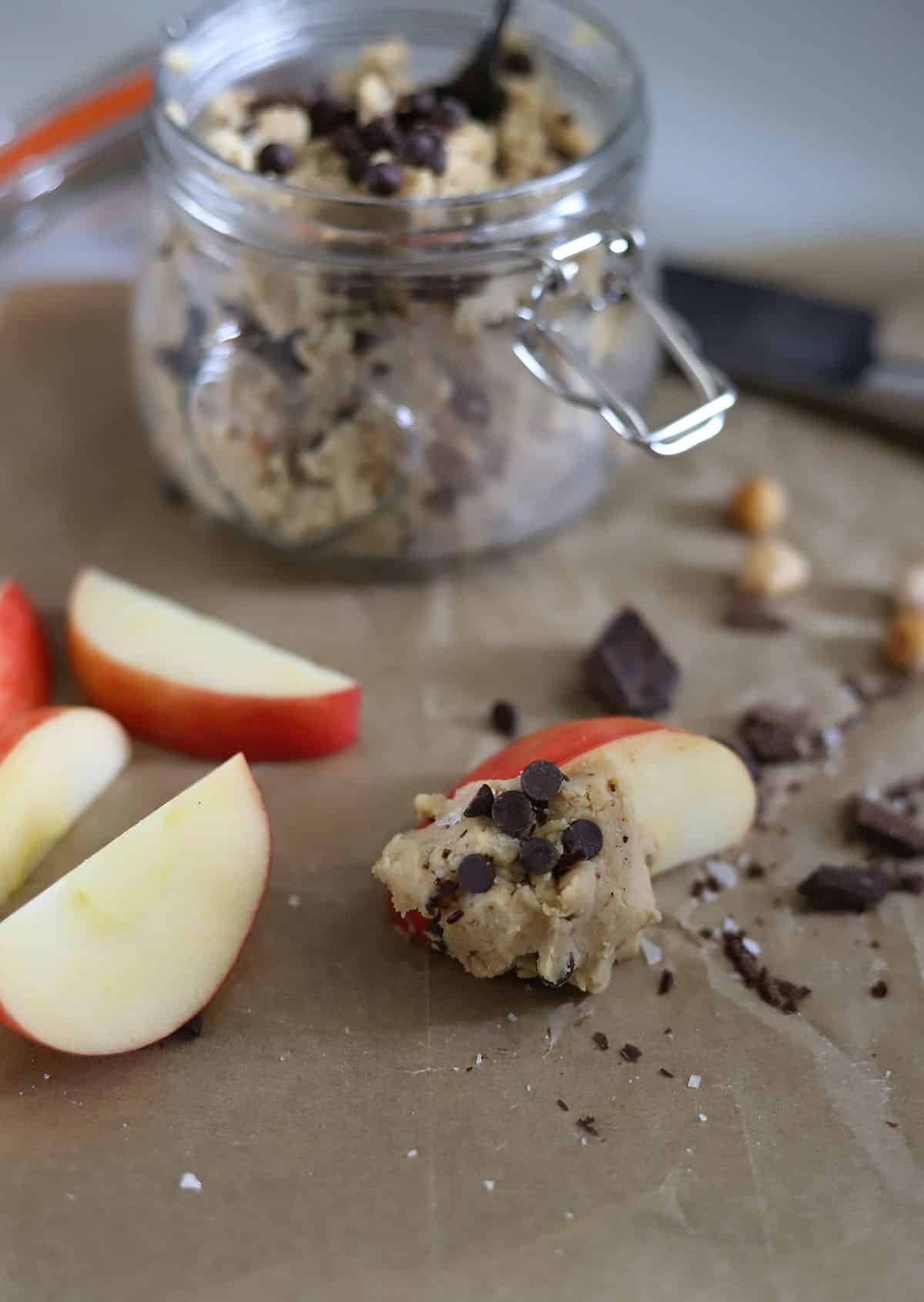 No bake protein cookie dough served with an apple slice